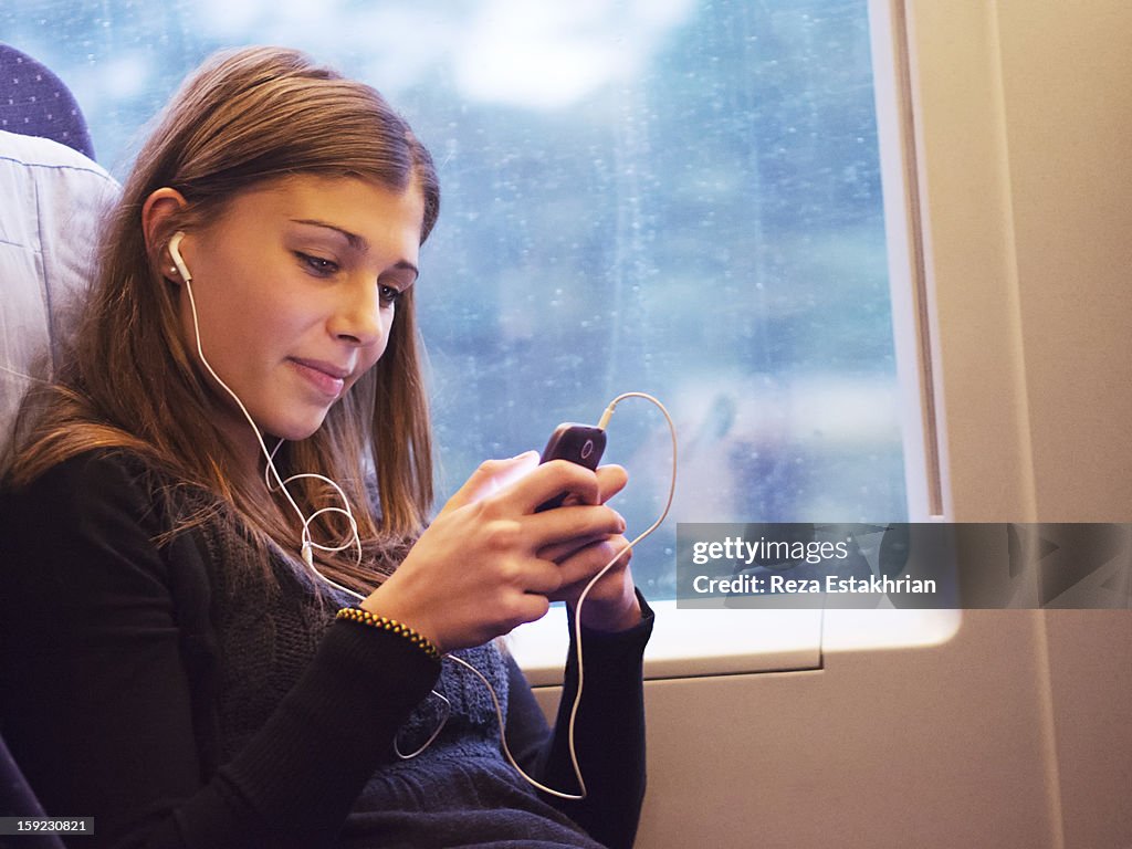 Woman checks cell phone