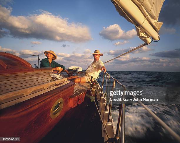 couple sailing classic yacht - classic day 2 stock-fotos und bilder