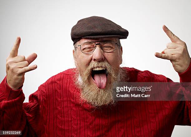 man wearing glasses - stick tongue out stock pictures, royalty-free photos & images
