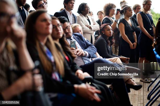 Guests listen to U.S. Vice President Kamala Harris address an event at Sycamore & Oak, a minority-owned retail village that houses other local small...