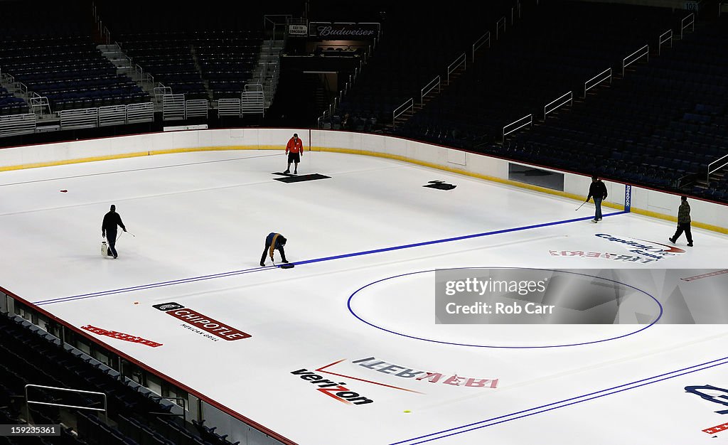 Washington Capitals Install Logo And Lines In Verizon Center Ice