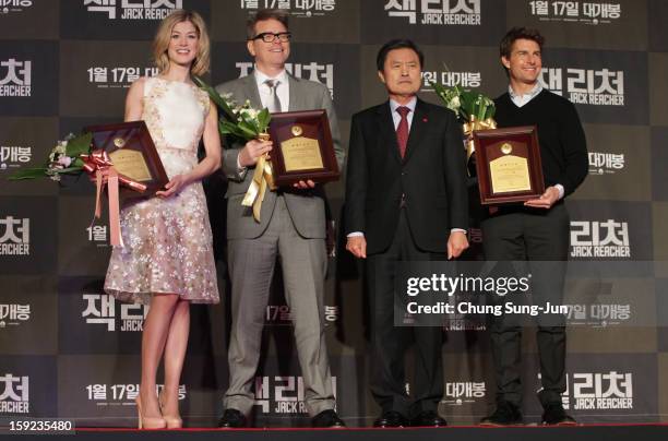 Actress Rosamund Pike, director Christopher McQuarrie and actor Tom Cruise receive an honorary citizens of the Busan City from City mayor Huh...