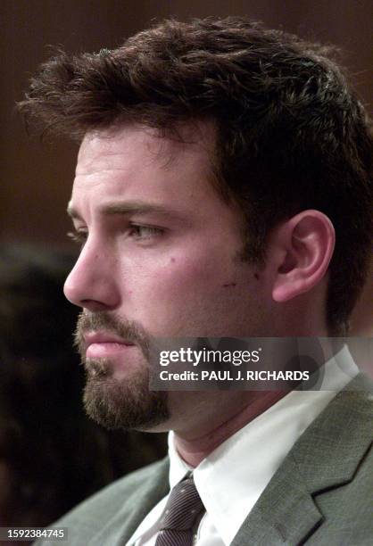 Actor Ben Affleck listens during talks on Capitol Hill, 11 July 2001 in Washington,DC, during a hearing on human genome research. Affleck urged...