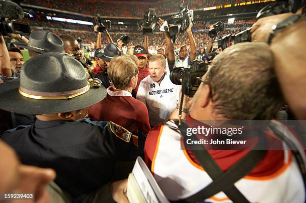 National Championship: Notre Dame coach Brian Kelly with Alabama coach Nick Saban after game at Sun Life Stadium. Miami Gardens, FL 1/7/2013 CREDIT:...