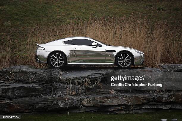 An Aston Martin motor car is displayed outside the company headquarters and production plant on January 10, 2013 in Gaydon, England. The iconic...