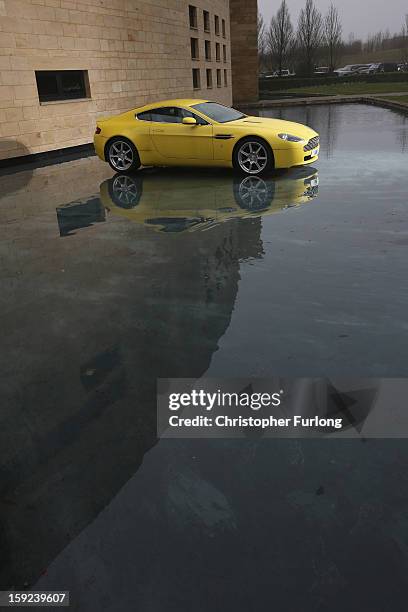 An Aston Martin motor car is displayed outside the company headquarters and production plant on January 10, 2013 in Gaydon, England. The iconic...