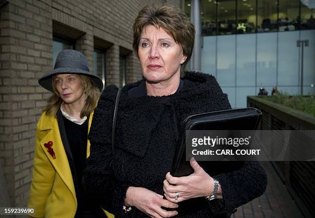 In this file picture taken on January 7, 2013 Detective April Casburn arrives at Southwark Crown Court in central London, to face charges related to...