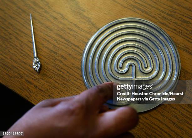 Eleanor Colvin, a pastor at St. Paul's United Methodist Church, also has a small hand labyrinth that she can use at her desk, Wednesday, Sept. 23 in...