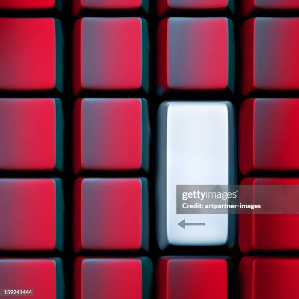 light blue enter key between red keys - enter key stock pictures, royalty-free photos & images