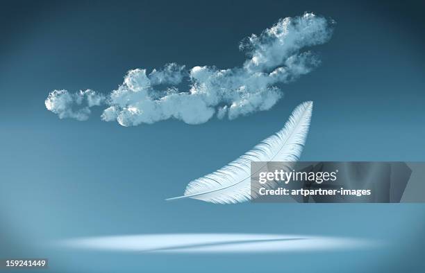 white feather falling from the blue sky - falling feathers stock pictures, royalty-free photos & images