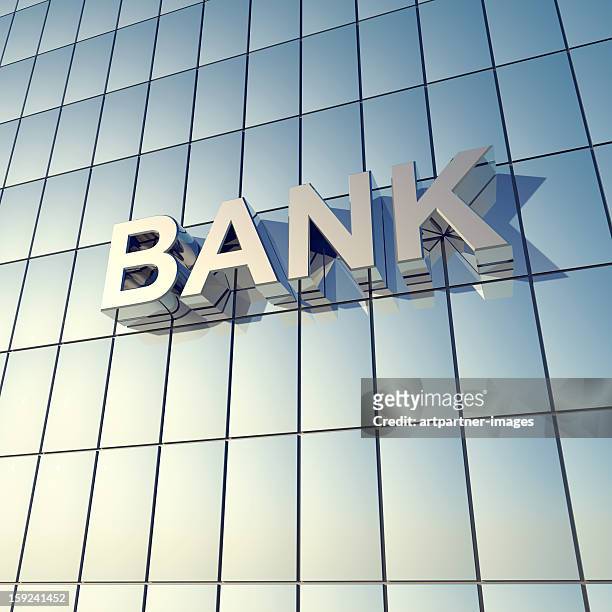 glass front of a bank building - banken stock-fotos und bilder
