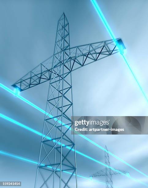 electricity pylon and glowing power lines - electricity pylon stock-fotos und bilder