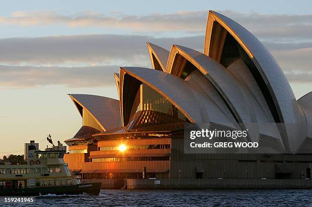 This recent photo shows a sunrise over one of the world's greatest tourism icons, the Sydney Opera House. The Opera House, the busiest performing...