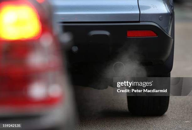 Exhaust fumes from a car in Putney High Street on January 10, 2013 in Putney, England. Local media are reporting local environmental campaigners...