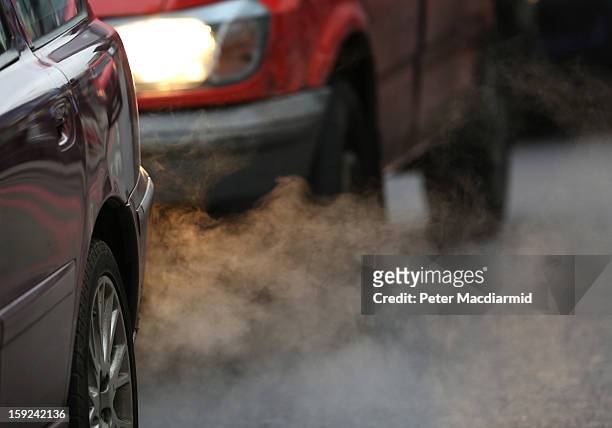 Exhaust fumes from a car in Putney High Street on January 10, 2013 in Putney, England. Local media are reporting local environmental campaigners...