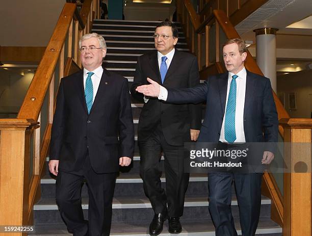 In this handout image provided by Justin MacInnes, Tánaiste Eamon Gilmore , Jose Manuel Barroso, President of the European Commission and Taoiseach...