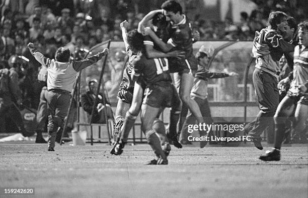 The Liverpool bench and players all celebrate as Alan Kennedy scores the last penalty in the penalty shoot-out to win the UEFA European Cup Final...