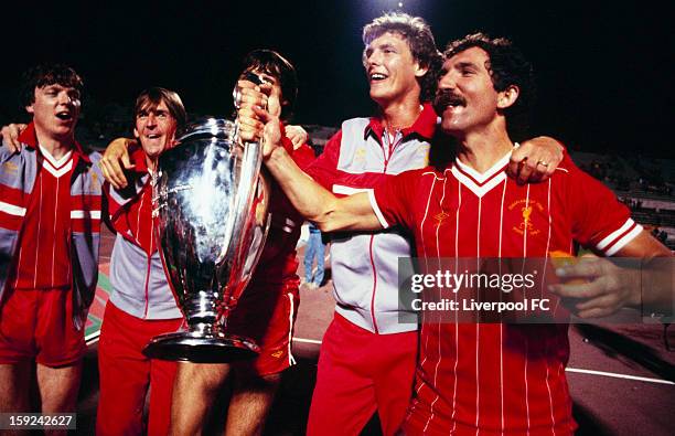 Liverpool players Steve Nicol, Kenny Dalglish, Alan Hansen , Gary Gillespie, and captain Greaeme Souness celebrate with the trophy after winning the...