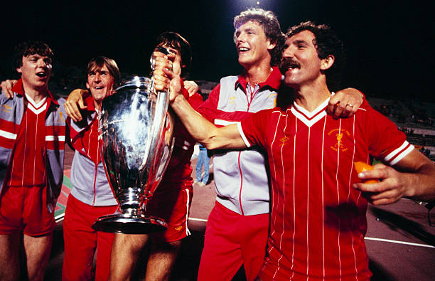 Liverpool players Steve Nicol, Kenny Dalglish, Alan Hansen , Gary Gillespie, and captain Greaeme Souness celebrate with the trophy after winning the...
