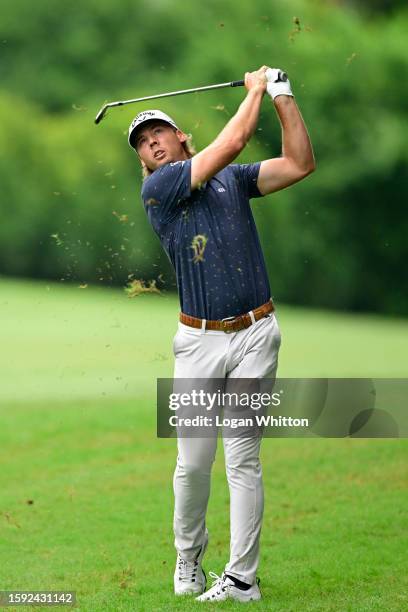 Sam Burns of the United States plays a shot on the fourth hole during the second round of the Wyndham Championship at Sedgefield Country Club on...