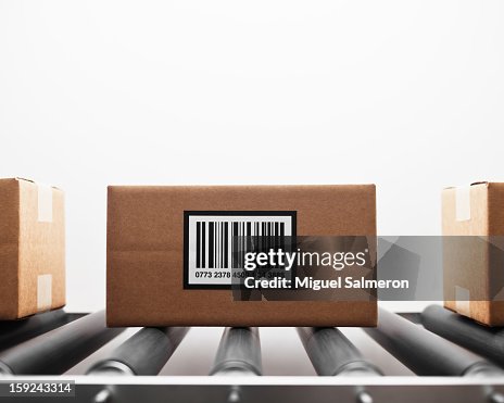 Packages With Large Barcode On Conveyor Belt Photo - Getty Images