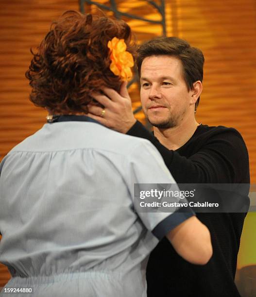 Raul Gonzalez and Mark Wahlberg on The Set Of Despierta America to promote new film "Broken City" at Univision Headquarters on January 10, 2013 in...