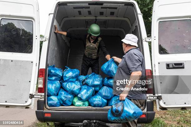 Volunteers distribute humanitarian aid to civilians amid Russia - Ukraine war in New York, Donetsk Oblast, Ukraine on August 10, 2023.