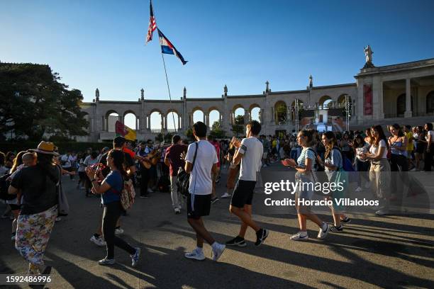 Young U.S. Pilgrims dance upon arrival in late afternoon at the sanctuary premises as members of the faithful of all ages and nationalities start...