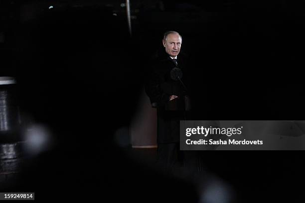 Russian President Vladimir Putin visits the heavy nuclear-powered missile cruiser Pyotr Veliky at the Russian Northern Fleet's base January 10, 2013...