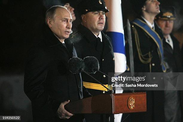 Russian President Vladimir Putin visits the heavy nuclear-powered missile cruiser Pyotr Veliky at the Russian Northern Fleet's base January 10, 2013...