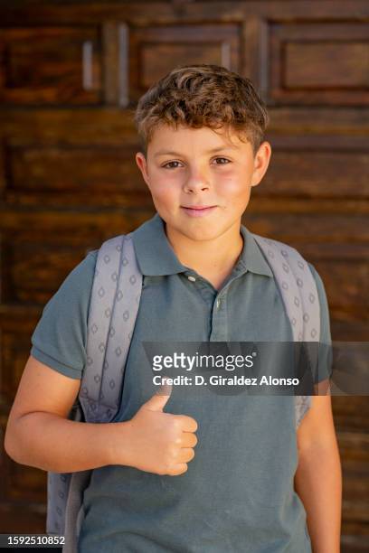boy pupil with bagpack - 13 year old cute boys stock pictures, royalty-free photos & images
