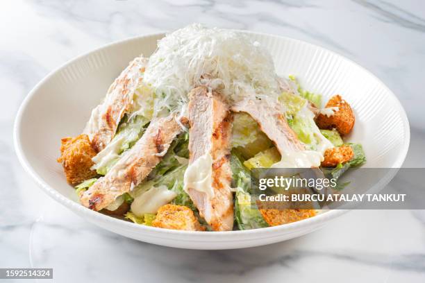 caesars salad with chicken - istanbul restaurant stock pictures, royalty-free photos & images