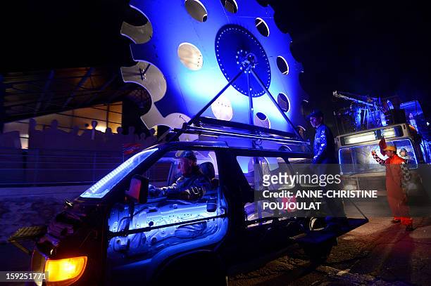 Artists perform on January 10, 2013 in Marseille southern France, during a rehearsal of the Light Parade by Sud Side Company ahead of the 2013...