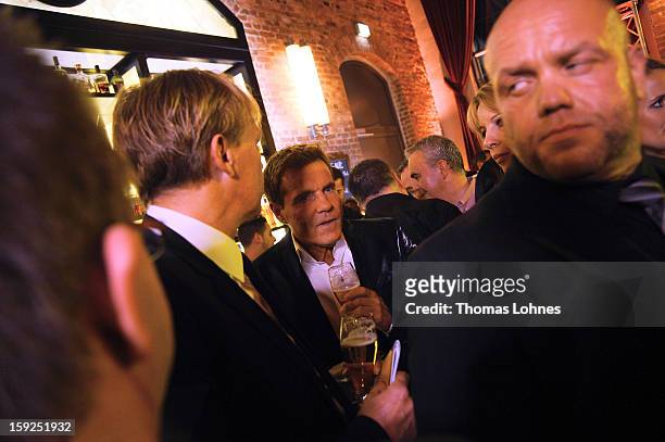 Entertainer and Singer Dieter Bohlen trinks beer during a party to present his wallpaper collection "Dieter Bohlen - it's different" in the...