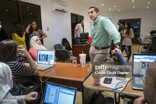 Bassem Youssef keeps an eye on the process as he and his writers parse ideas for the upcoming season on October 04 in Cairo, Egypt. Youssef is an...