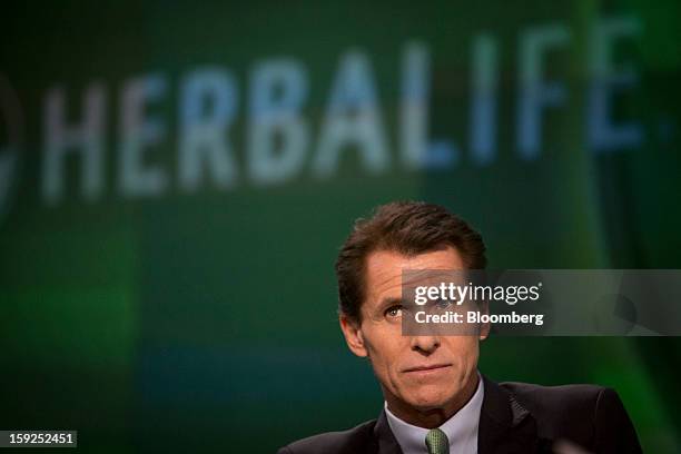 Desmond "Des" Walsh, president of Herbalife Ltd., pauses during a Bloomberg Television interview in New York, U.S., on Thursday, Jan. 10, 2013....