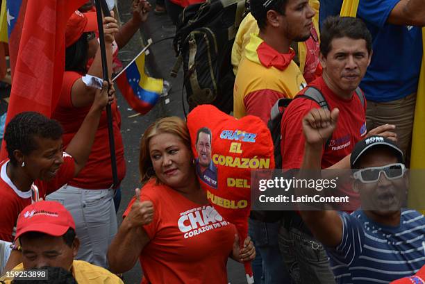 Supporters of Venezuelan President Hugo Chavez gather around Miraflores Presidential Palace on January 10, 2013 in Caracas, Venzuela. Chavez is now...