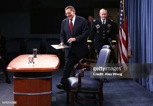 Defense Secretary Leon Panetta and Chairman of the Joint Chiefs of Staff Gen. Martin Dempsey arrive at a news briefing at the Pentagon January 10,...