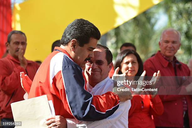 Nicolas Madure, Vice President in Office of Venezuela greets Ricardo Patio, Minister of Foreign affairs of Ecuador, during a meeting to support Hugo...