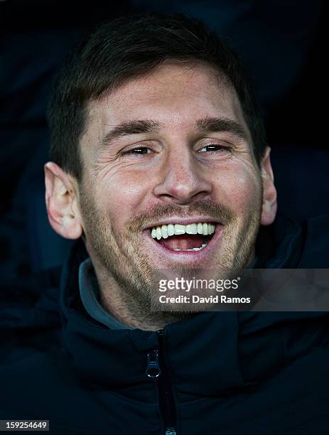 Lionel Messi of FC Barcelona smiles on the bench prior to the Copa del Rey round of sixteen second leg match between FC Barcelona and Cordoba CF at...