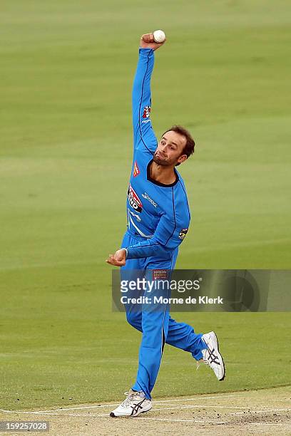 Nathan Lyon of Adelaide bowls during the Big Bash League match between the Adelaide Strikers and the Perth Scorchers at Adelaide Oval on January 10,...