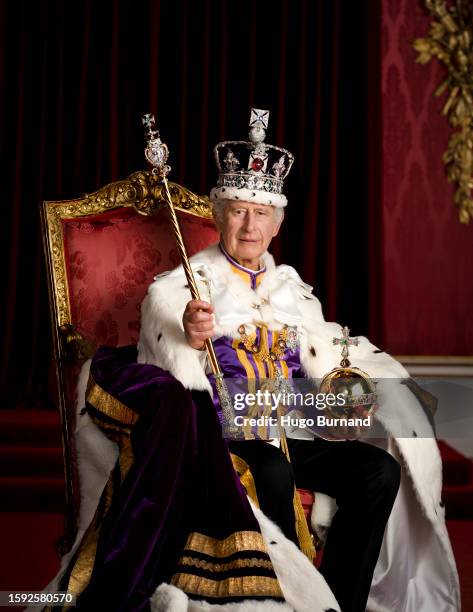 King Charles III is pictured in full regalia in the Throne Room at Buckingham Palace. The King is wearing the Robe of Estate, the Imperial State...