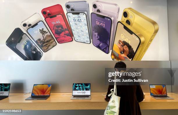 Customer shops for Apple products at an Apple Store on August 04, 2023 in Berkeley, California. Shares of Apple stock fell on Friday morning after...