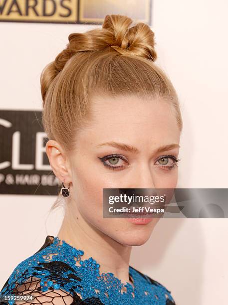 Actress Amanda Seyfried arrives at the 18th Annual Critics' Choice Movie Awards at The Barker Hangar on January 10, 2013 in Santa Monica, California.