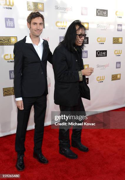 Director Malik Bendjelloul and Musician Sixto Rodriguez attend the Critics' Choice Movie Awards 2013 with Skinnygirl Cocktails at Barkar Hangar on...