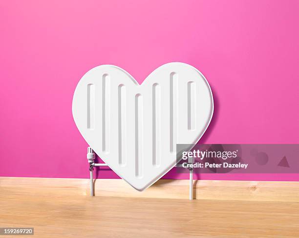 heart shaped radiator - hot pink stockfoto's en -beelden