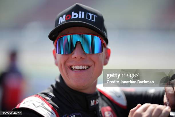 John Hunter Nemechek, driver of the Mobil 1 Toyota, share a laugh with crew on the grid during qualifying for the NASCAR Xfinity Series Cabo Wabo 250...