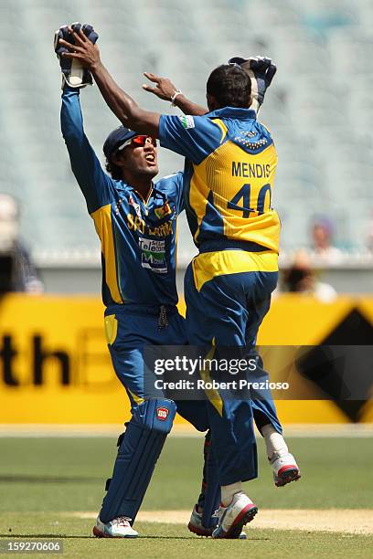 Ajantha Mendis of Sri Lanka celebrates the wicket of Aaron finch of Australia during game one of the Commonwealth Bank One Day International series...