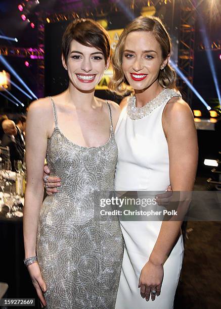 Actresses Anne Hathaway and Emily Blunt attend the 18th Annual Critics' Choice Movie Awards held at Barker Hangar on January 10, 2013 in Santa...