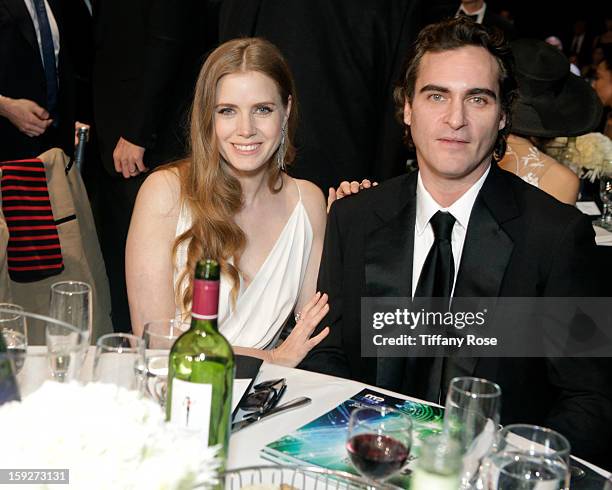 Actress Amy Adams and actor Joaquin Phoenix attend the Critics' Choice Movie Awards 2013 with Champagne Nicolas Feuillatte at Barkar Hangar on...